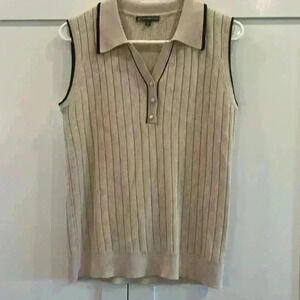 Women’s size large tan sweater vest with three detailed buttons trimmed in black
